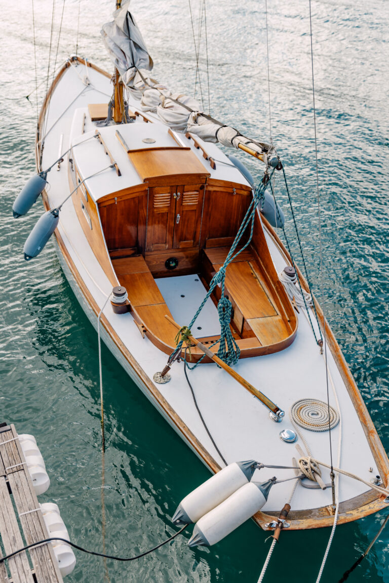 luxury classic sailing boat with wooden interior, in blue waters