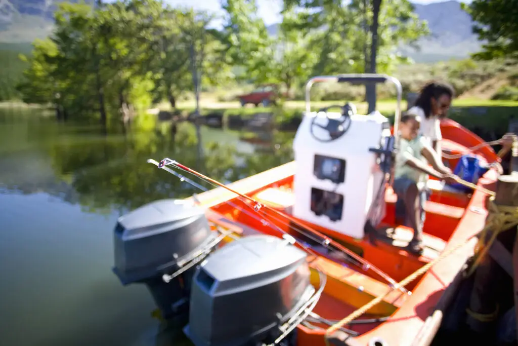 Father and son boating on a lake